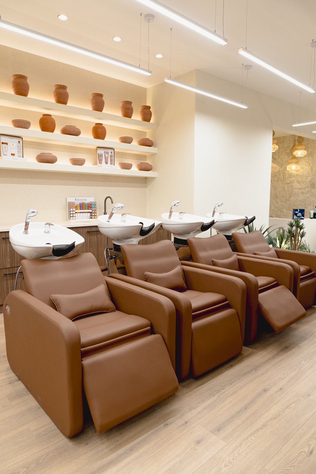 Washing area at the Art.Z Wellness Club, with reclining chairs